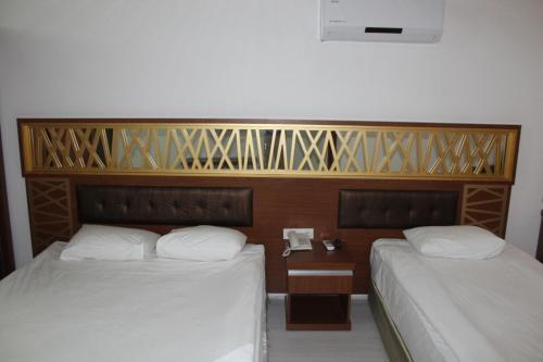 Foto de una habitación de Hotel Gül Otel
