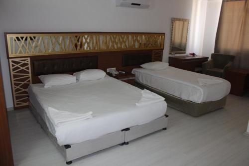 Foto de una habitación de Hotel Gül Otel