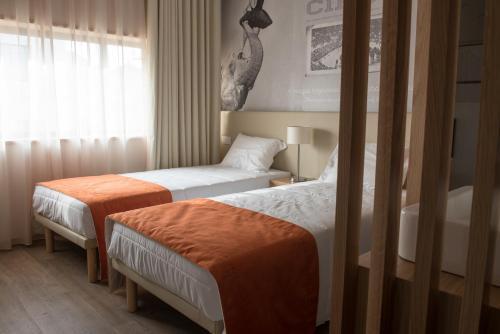 Foto de una habitación de Porto Coliseum Hotel