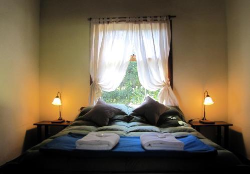 Foto de una habitación de Hostel La Angostura