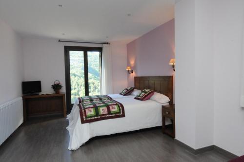 Foto de una habitación de Casa Rural La Comella