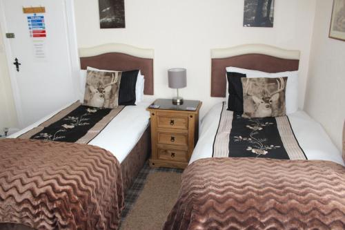 Foto de una habitación de Pitfaranne Guest House
