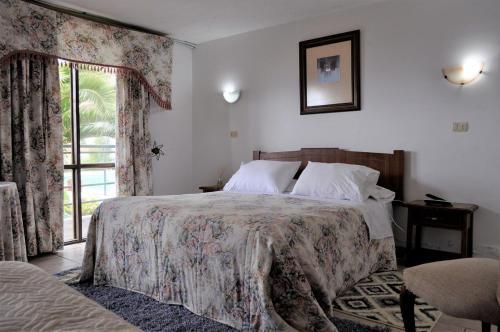 Foto de una habitación de Hotel Hosteria Iloca