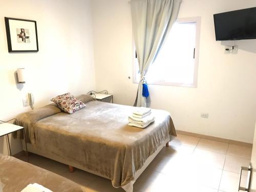 Foto de una habitación de Faro del Parque