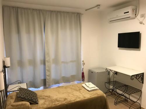 Foto de una habitación de Faro del Parque