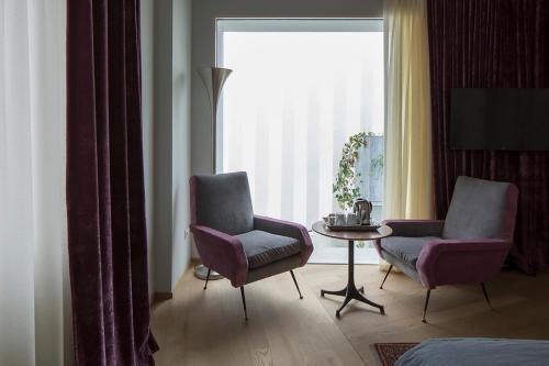 Foto de una habitación de Ai Bastioni Boutique Hotel