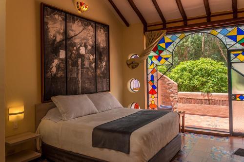 Foto de una habitación de Hotel Suites Arcoiris