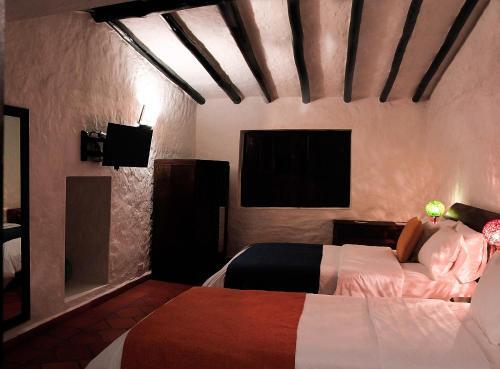 Foto de una habitación de Hotel Casona Quesada