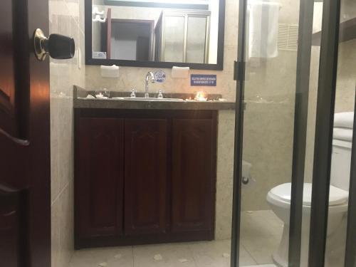 Foto de una habitación de Hotel Maria Gloria