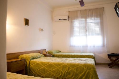 Foto de una habitación de Centro Neuquen Hotel