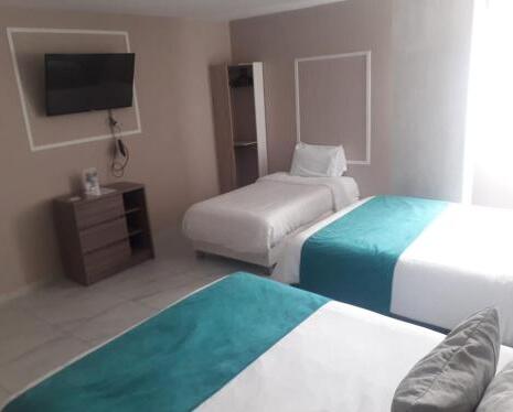 Foto de una habitación de Hotel OR Suites