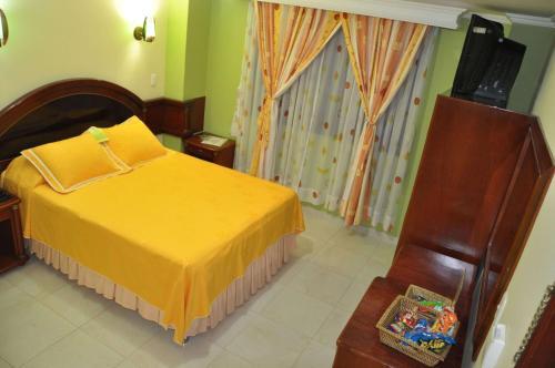 Foto de una habitación de Hotel el Caimito