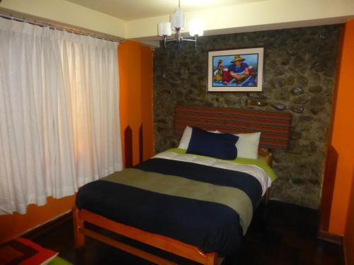Foto de una habitación de Hostal Casa Del Inka