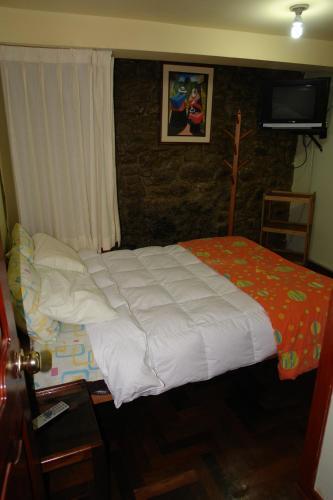 Foto de una habitación de Hostal Casa Del Inka