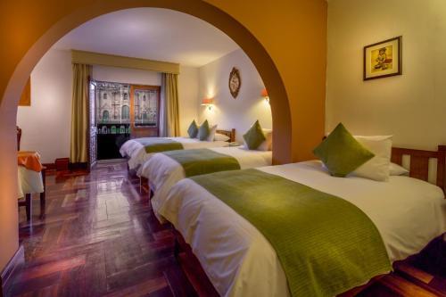 Foto de una habitación de Hotel El Virrey Boutique