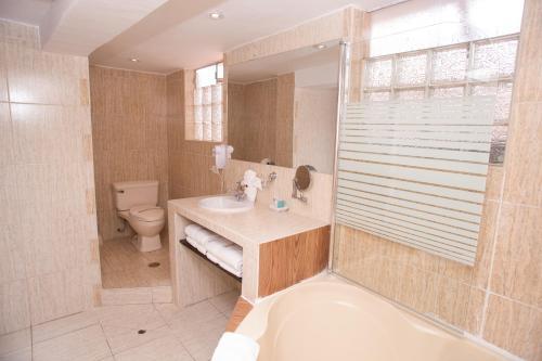 Foto de una habitación de Hotel Arcangel
