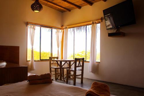 Foto de una habitación de Hotel El Mirador de Vichayito