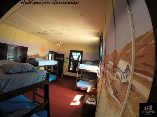 Foto de una habitación de Albergue La Casona de Lobitos