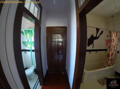 Foto de una habitación de Albergue La Casona de Lobitos
