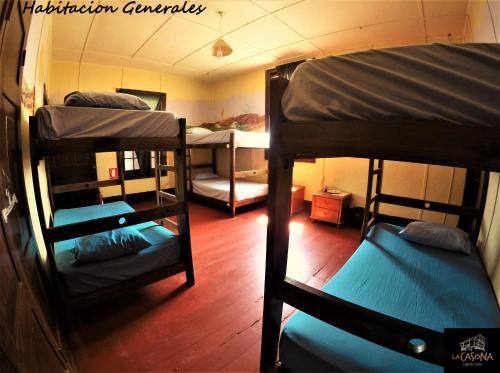 Foto de una habitación de Albergue La Casona de Lobitos