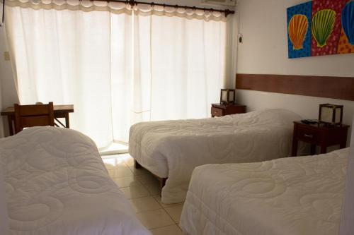 Foto de una habitación de Hotel Los Balcones de Zorritos