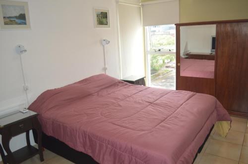 Foto de una habitación de Apartamentos Edificio Rodrigo
