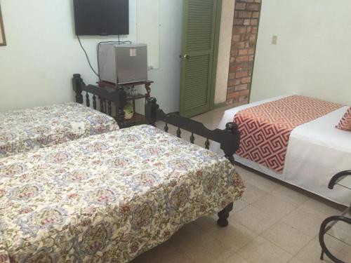Foto de una habitación de Hotel Hosteria de la Plaza Menor