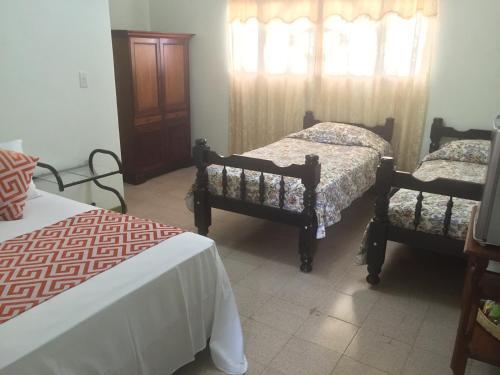Foto de una habitación de Hotel Hosteria de la Plaza Menor