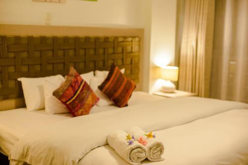 Foto de una habitación de Hotel Wayta Inn