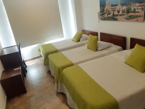 Foto de una habitación de Hotel Milán