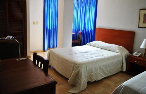 Foto de una habitación de Hotel Majayura