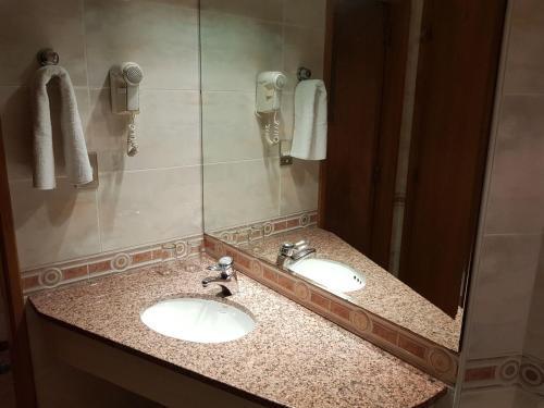 Foto de una habitación de Apartamentos Departamento Céntrico