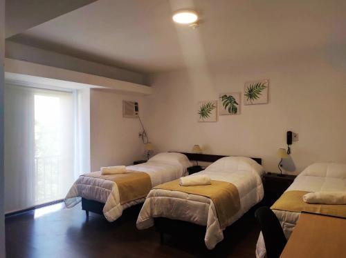 Foto de una habitación de EMILIA HOTEL