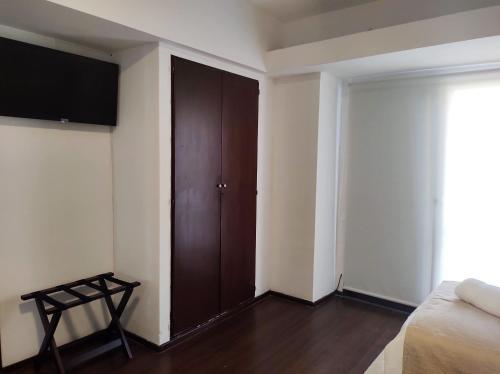Foto de una habitación de EMILIA HOTEL