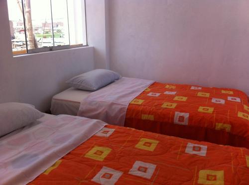 Foto de una habitación de Albergue Icthus Paracas