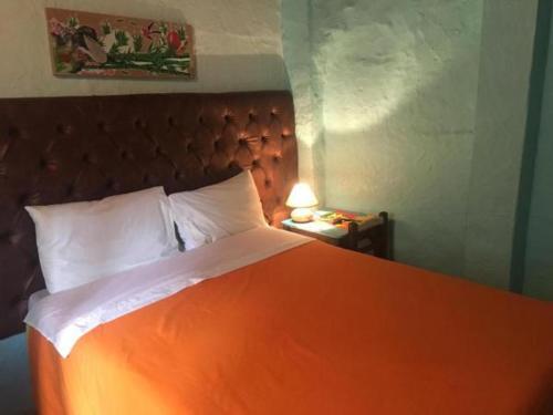 Foto de una habitación de Hostal Casa Colibrí