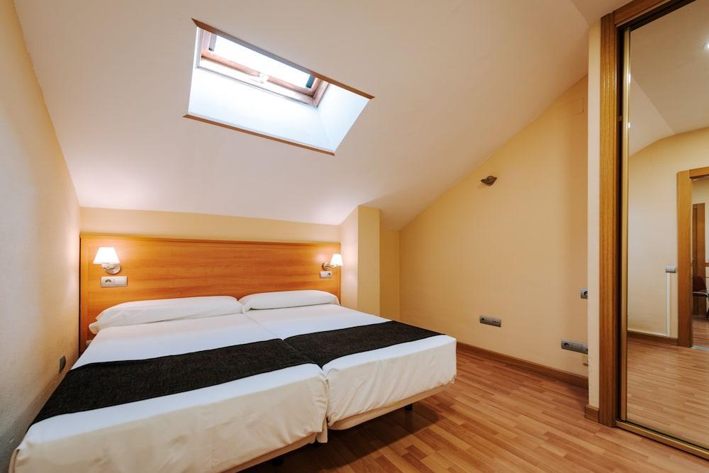 Foto de una habitación de JCH Congreso Apartamentos