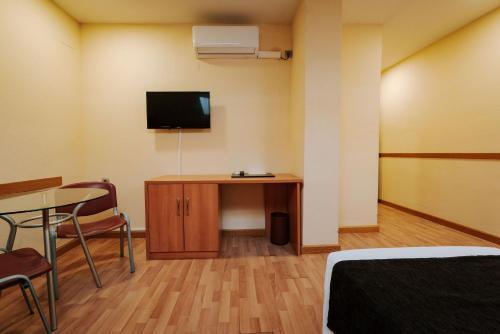 Foto de una habitación de JCH Congreso Apartamentos