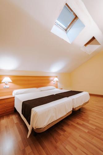 Foto de una habitación de JCH Congreso Apartamentos