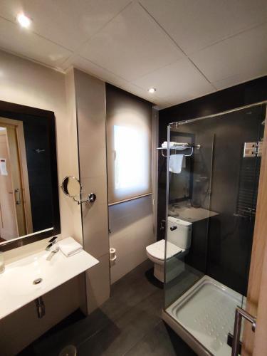 Foto de una habitación de Hotel Puerta del Arco