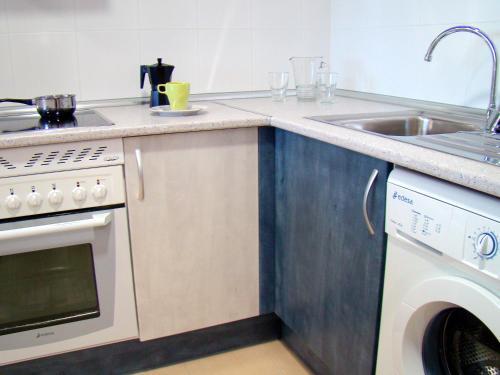 Foto de una habitación de Aparthotel Encasa