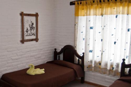 Foto de una habitación de Yerba Buena casas de campo - Arroyo de los Patos