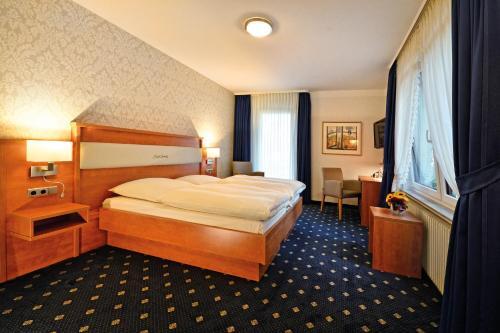Foto de una habitación de Landgasthaus &amp;amp; Hotel Lindenhof