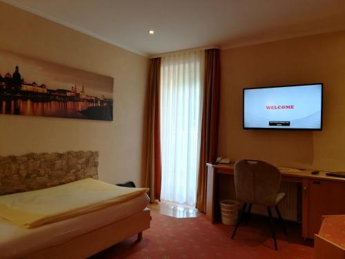 Foto de una habitación de Hotel Ladenmühle