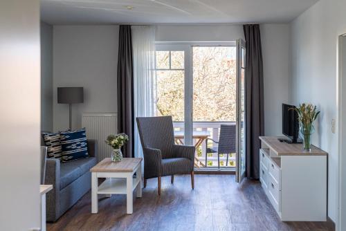 Foto de una habitación de Strandhafer Aparthotel