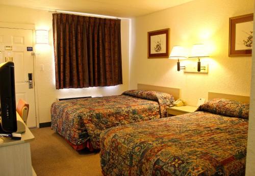 Room – Motel QC Stay Inn