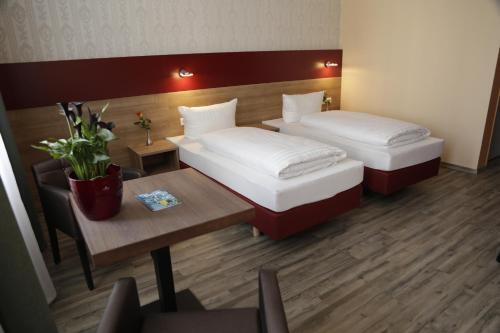 Foto de una habitación de Alexander Business Hotel Hannover City