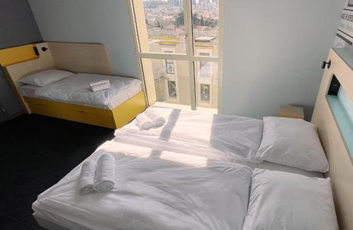 Foto de una habitación de MEININGER Hotel Bordeaux Gare Saint-Jean
