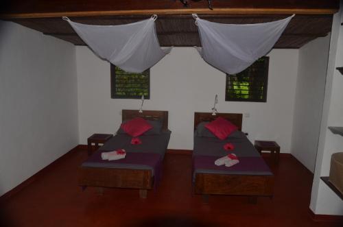 Foto de una habitación de Boraha Village Ecolodge