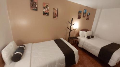 Foto de una habitación de Tambo Inn Machupicchu Hostal